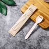 Natural biodegradable bamboo tableware Disposable bamboo tableware and toilet paper bamboo tableware gathered in the kitchen