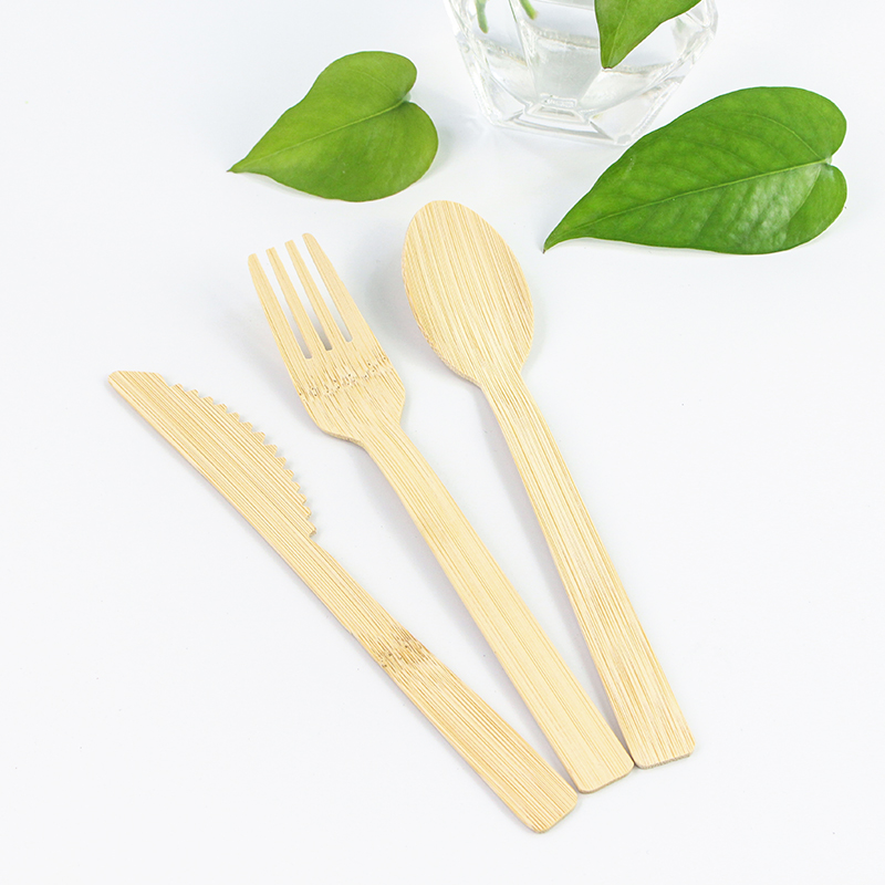 Travel cutlery set biodegradable cutlery Wooden spoon knife fork napkin in a paper wrap