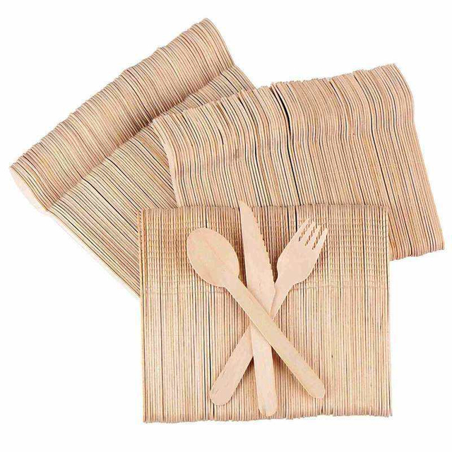 Natural biodegradable bamboo tableware Disposable bamboo tableware and toilet paper bamboo tableware gathered in the kitchen